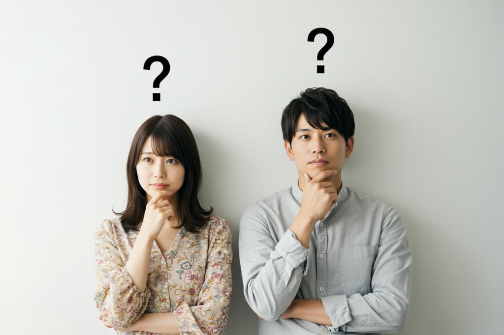 親知らずが痛くなる原因を考える男女
