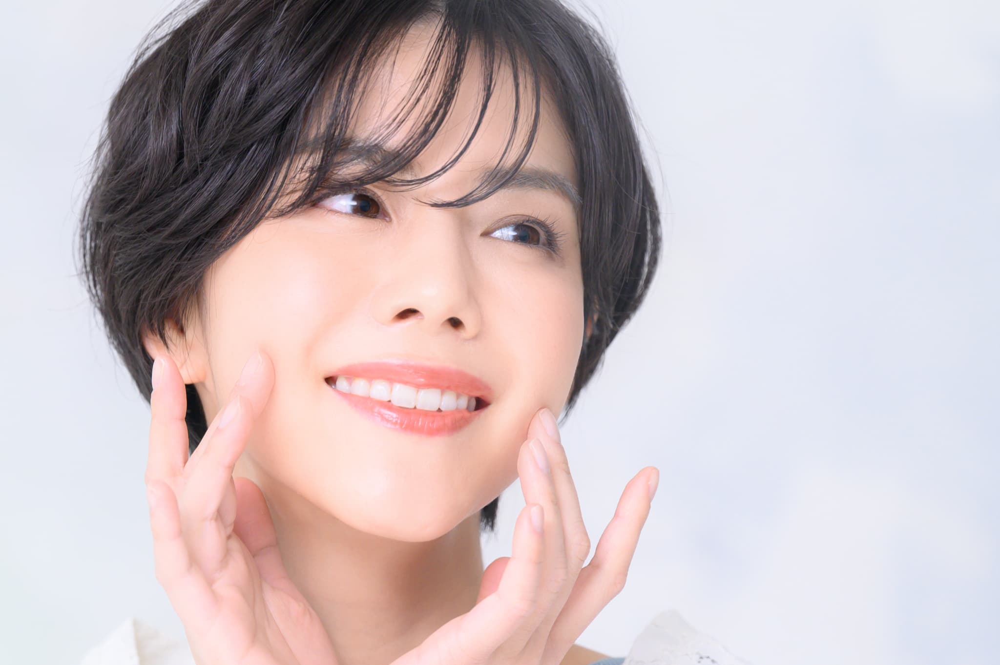 PMTCを受け笑顔を見せる女性